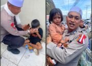 Hadir Untuk Masyarakat, Personel BKO Polda Kalteng Bantu Anak Terpisah dari Keluarga saat Haul Guru Sekumpul
